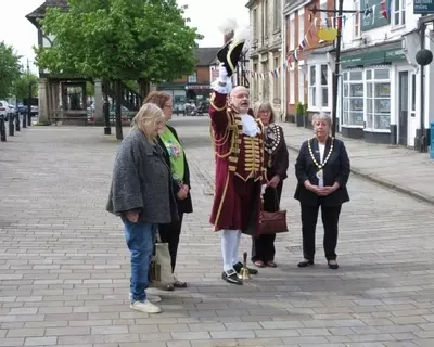 Our Town Crier commemorating the 1st Anniversary since the Coronation of King Charles III. 